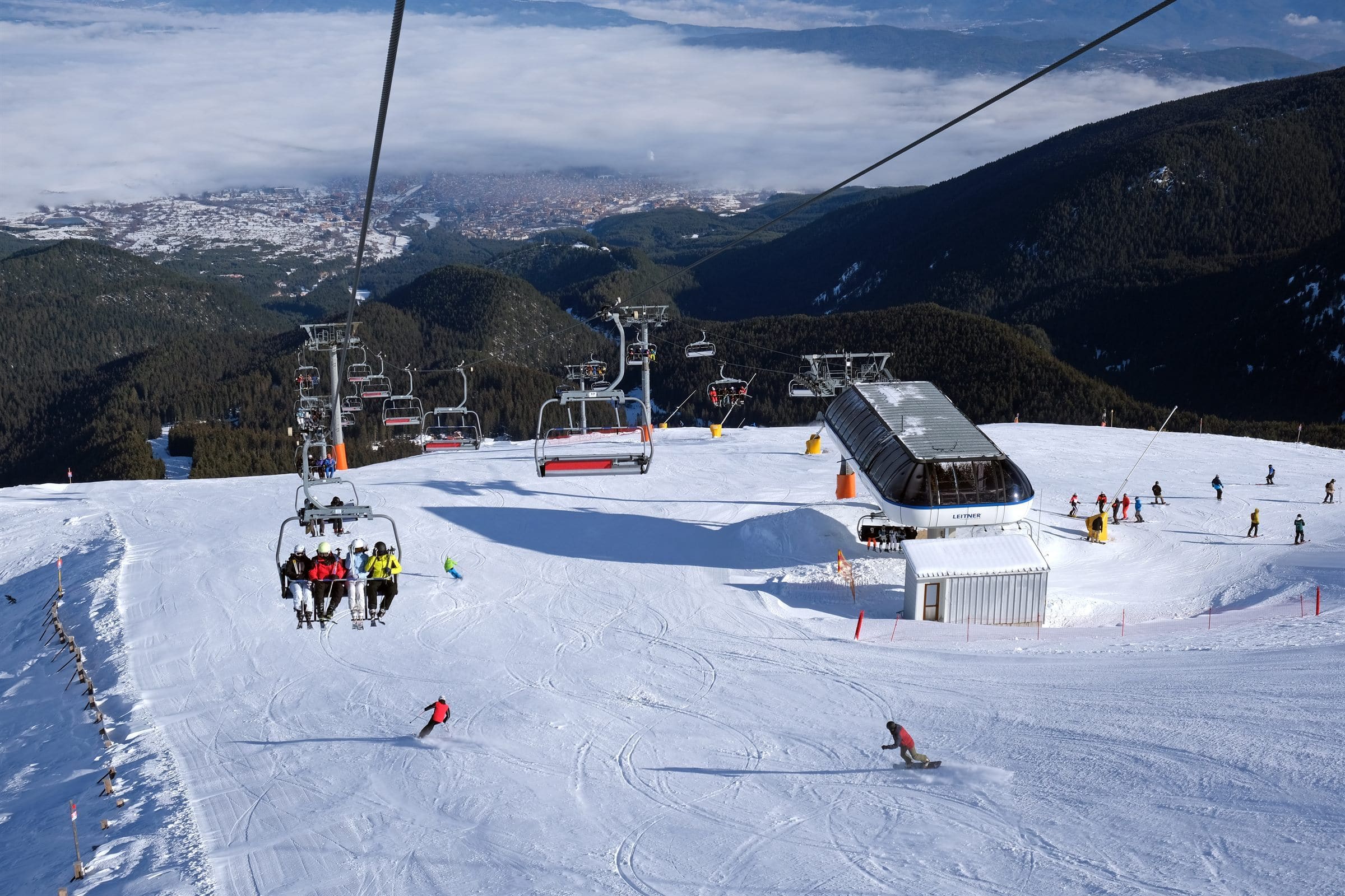 The town of Bansko under a sea of cloud, seen from the chairlift